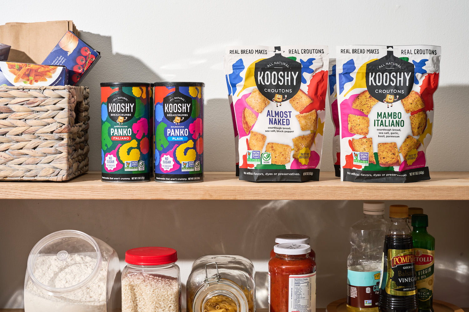 a pantry showing packages of Kooshy with other products like rice and cooking oil.