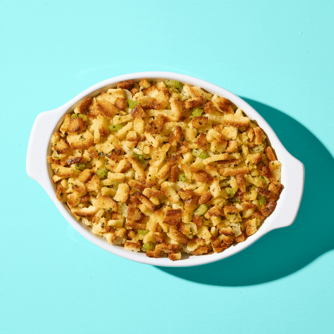Sourdough stuffing in casserole dish being slowly eaten as a gif
