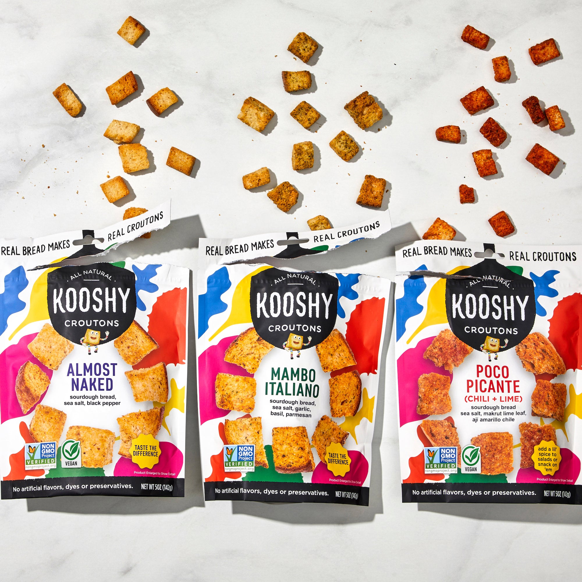 lineup of all Kooshy crouton flavors in packaging.