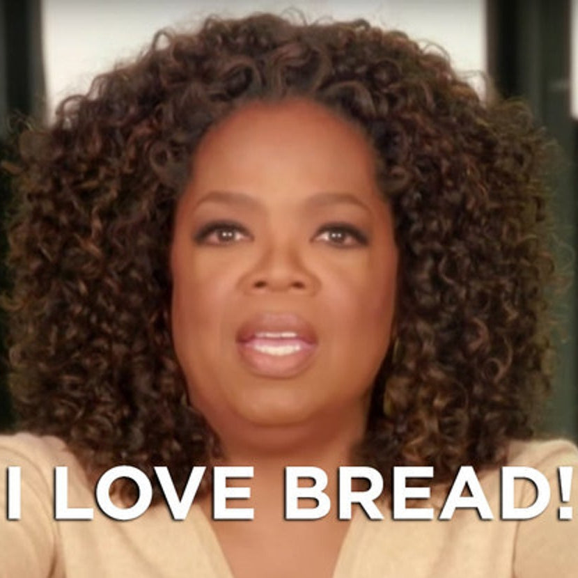 Oprah Winfrey with text 'I LOVE BREAD!' on a blurred background