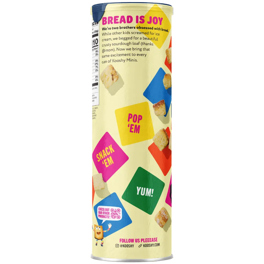 A tall cylindrical canister of Kooshys sourdough minis, featuring a pale yellow background with colorful geometric shapes and text, photographed on a transparent background.