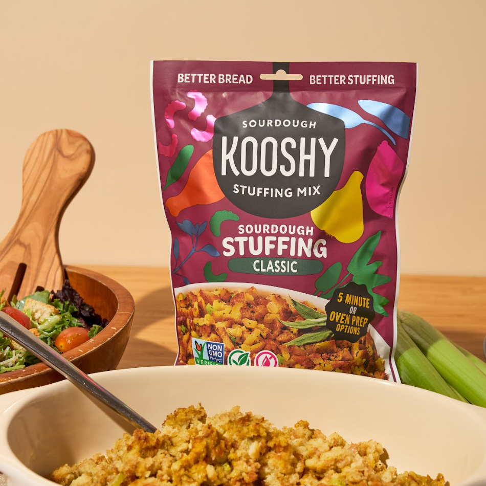 stuffing package next to bowl of stuffing and a salad plus celery stalk