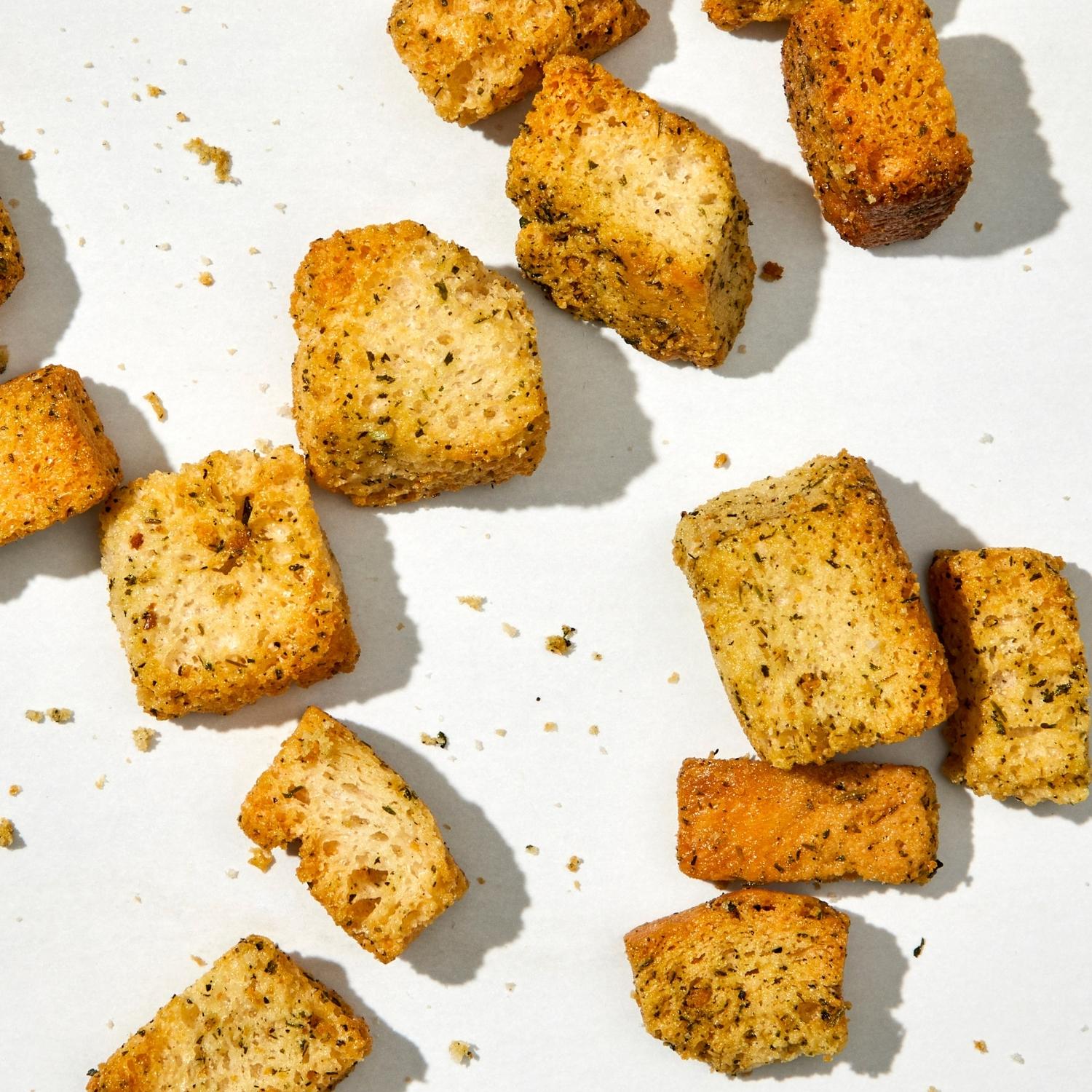 Detailed photo of Mambo Italiano flavor of croutons showing the seasoning and oven browning.