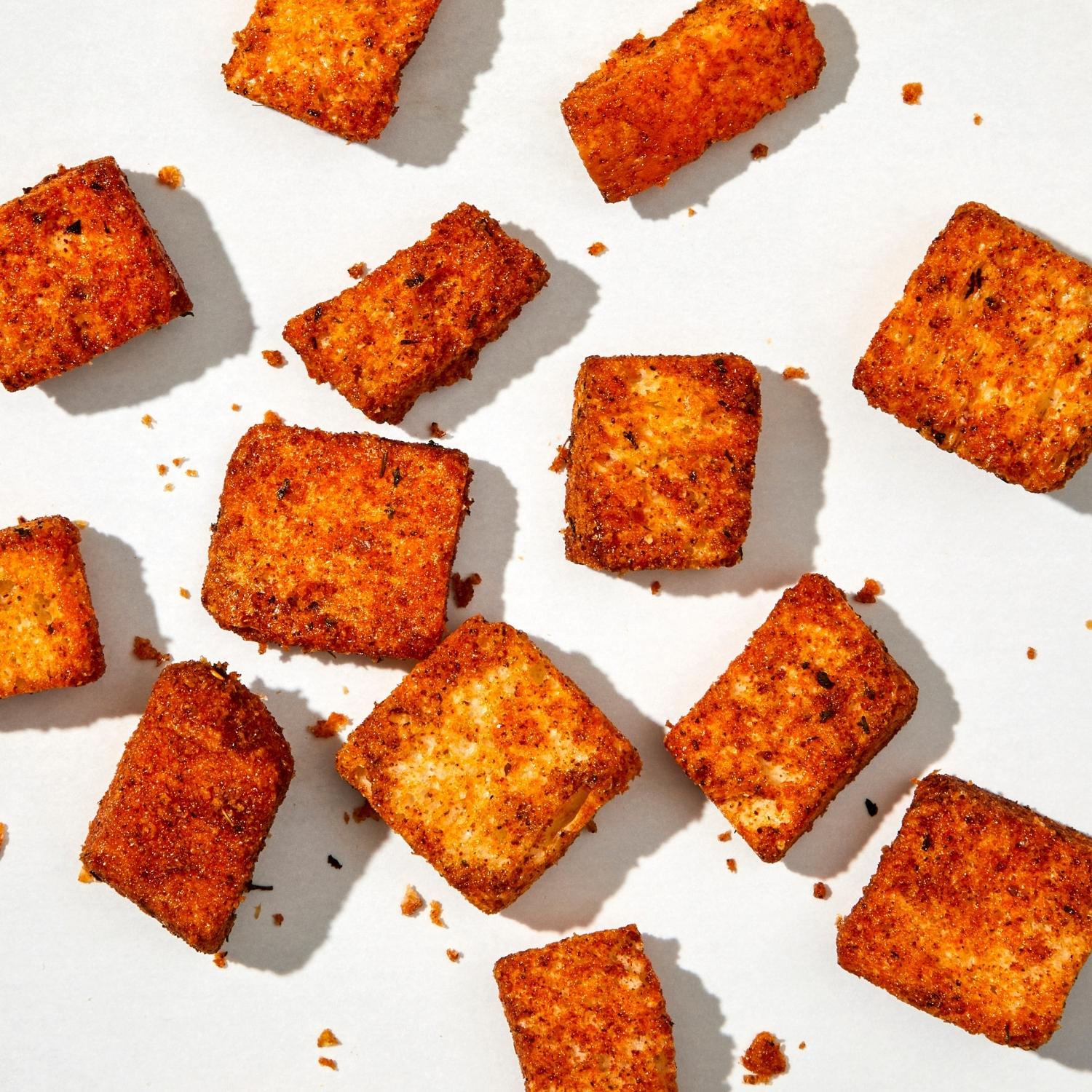 Detailed photo of Poco Picante flavor of croutons showing the seasoning and oven browning.